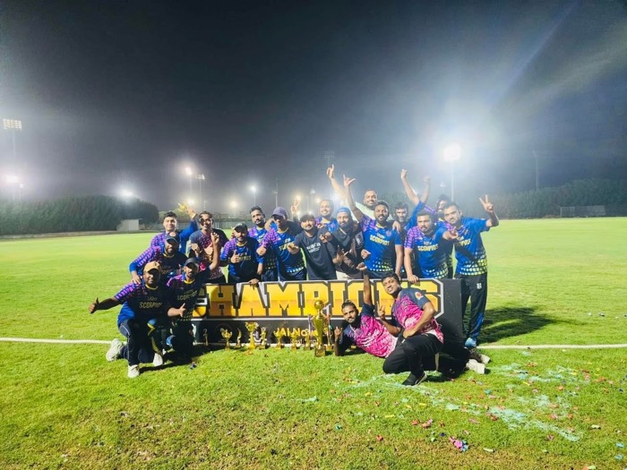 Champions group photo on the field